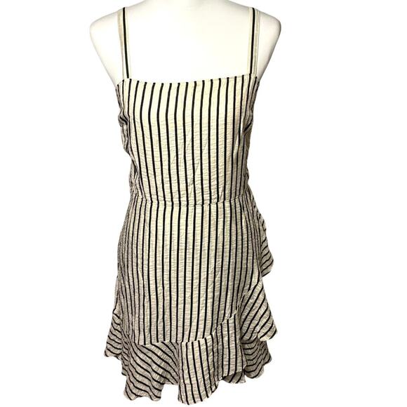 Express Dresses & Skirts - Express Striped Ruffle Hem Mini Dress Women’s Large Cream Black Smocked Back​